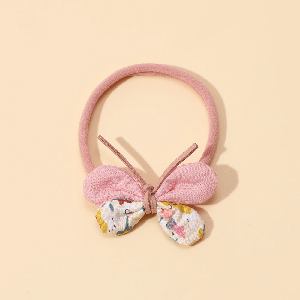 Diadema rosa de nailon para bebé recién nacido con lazo y flores - imagen 4