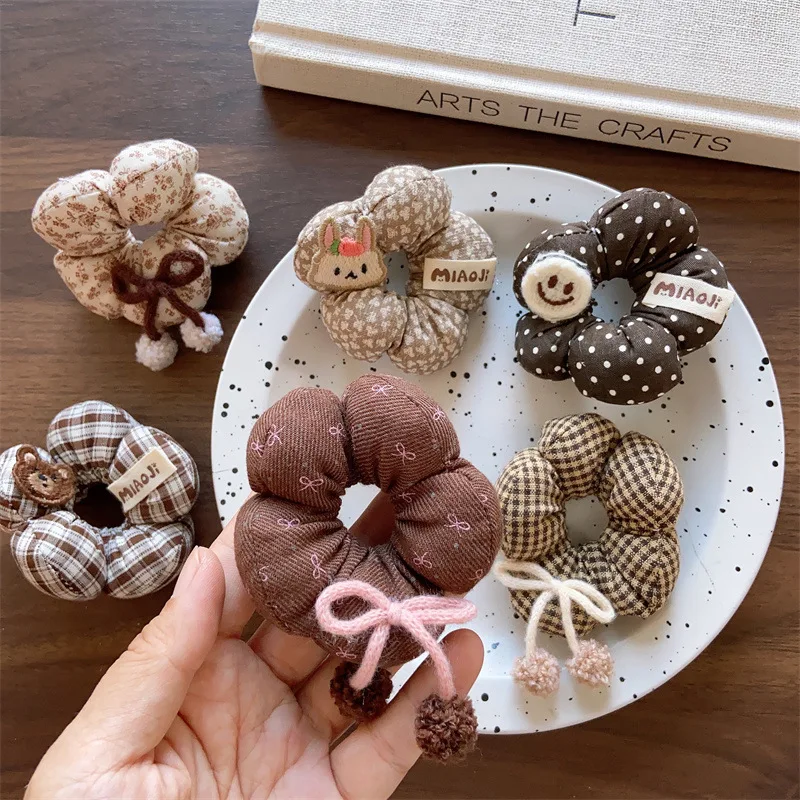 Coleteros elásticos infantiles con flores de algodón rellenas
