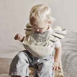 Baberos impermeables para bebé con alas de ángel anti-salpicaduras