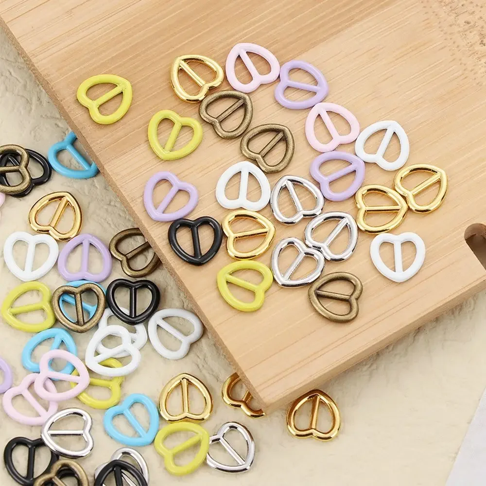 Hebilla corazón metálica mini para muñecas y accesorios infantiles