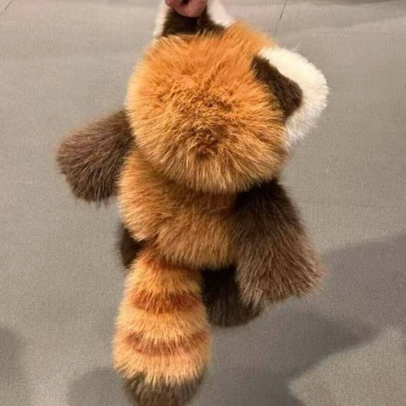 Peluche de mapache rojo de tela suave, ideal para abrazar
