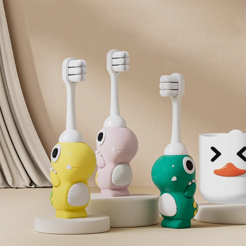 Cepillo de dientes infantil con dinosaurio y cerdas suaves