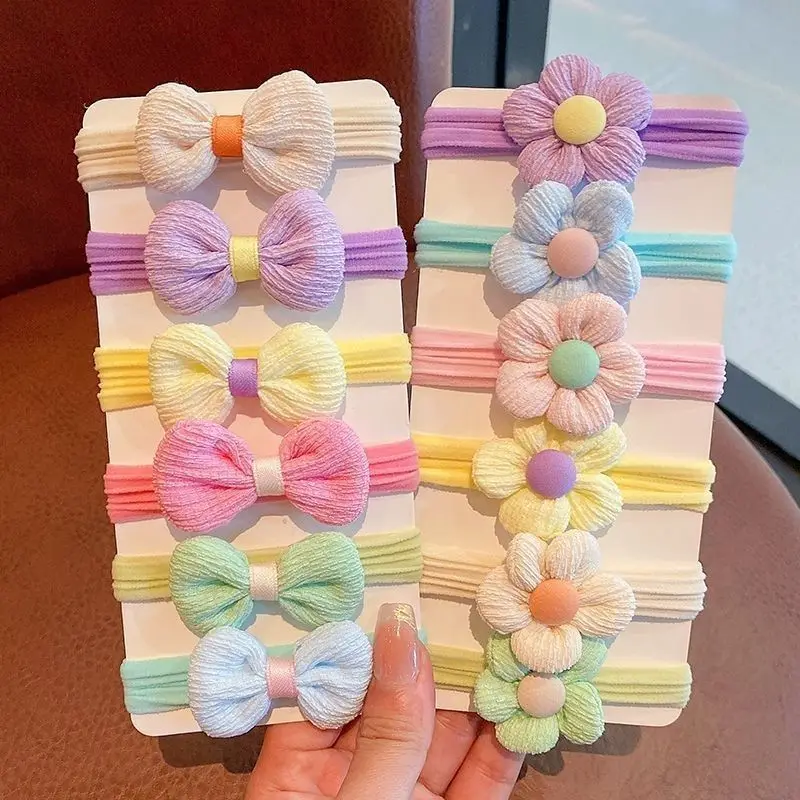 Bandas elásticas con flores pequeñas y colores pastel