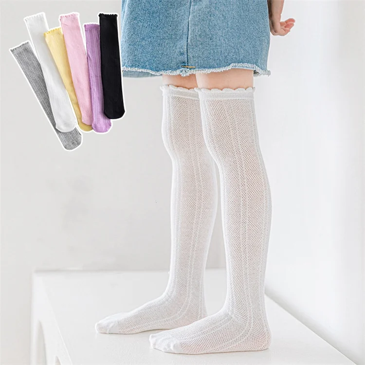 Calcetines largos de malla para niña color rosa