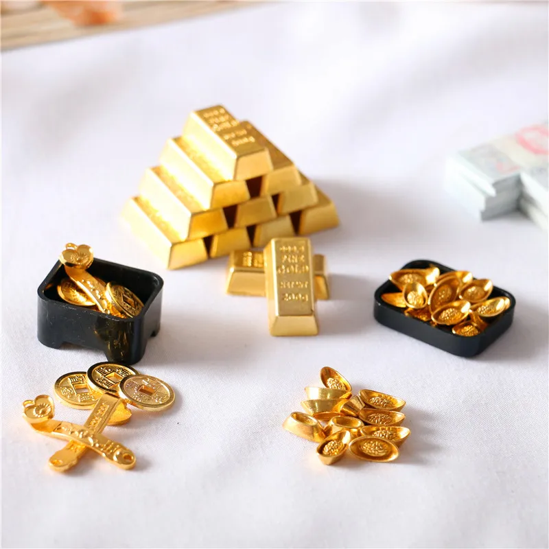 Lingotes de oro dorados para casa de muñecas