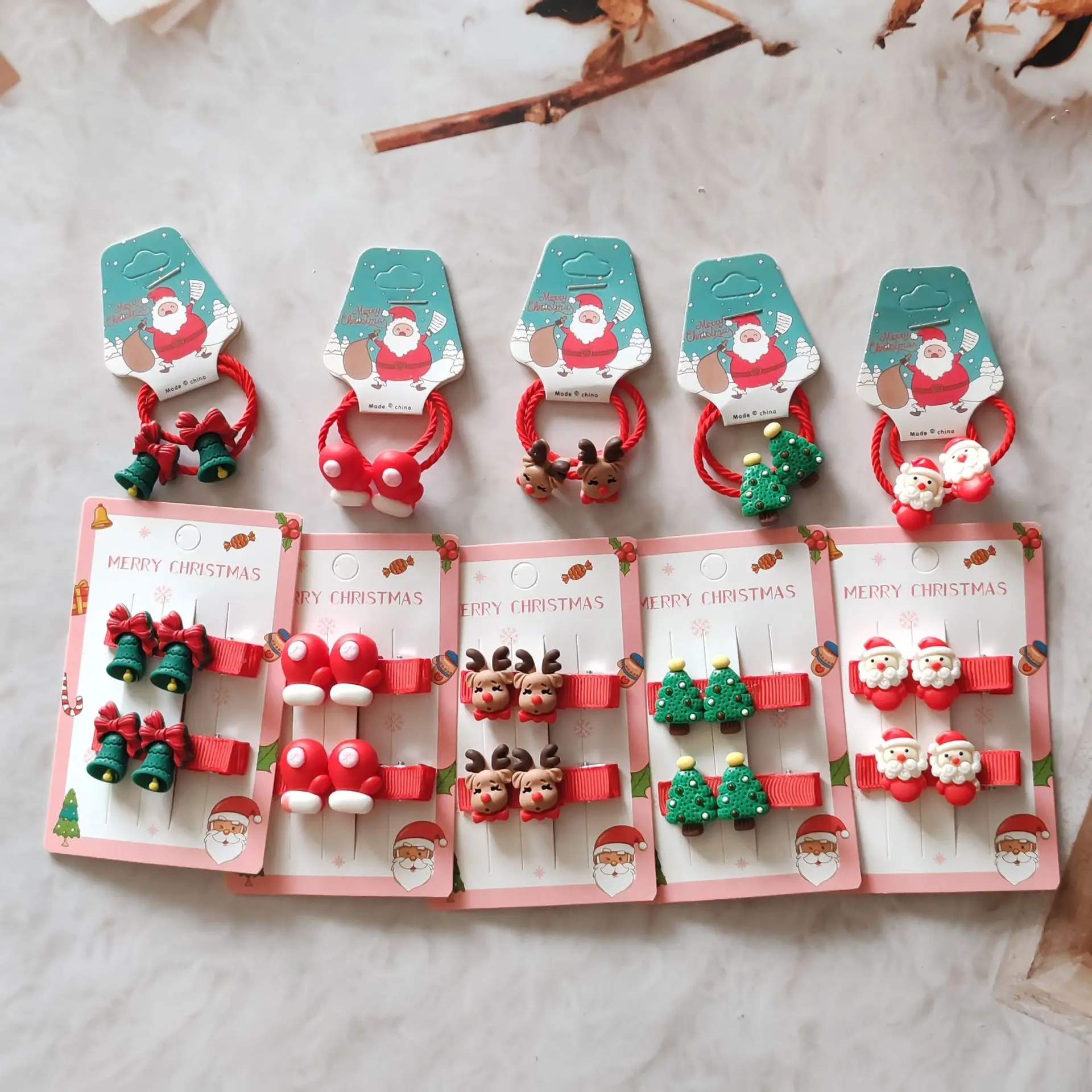 Pinzas y coleteros navideños elásticos para el pelo de niña