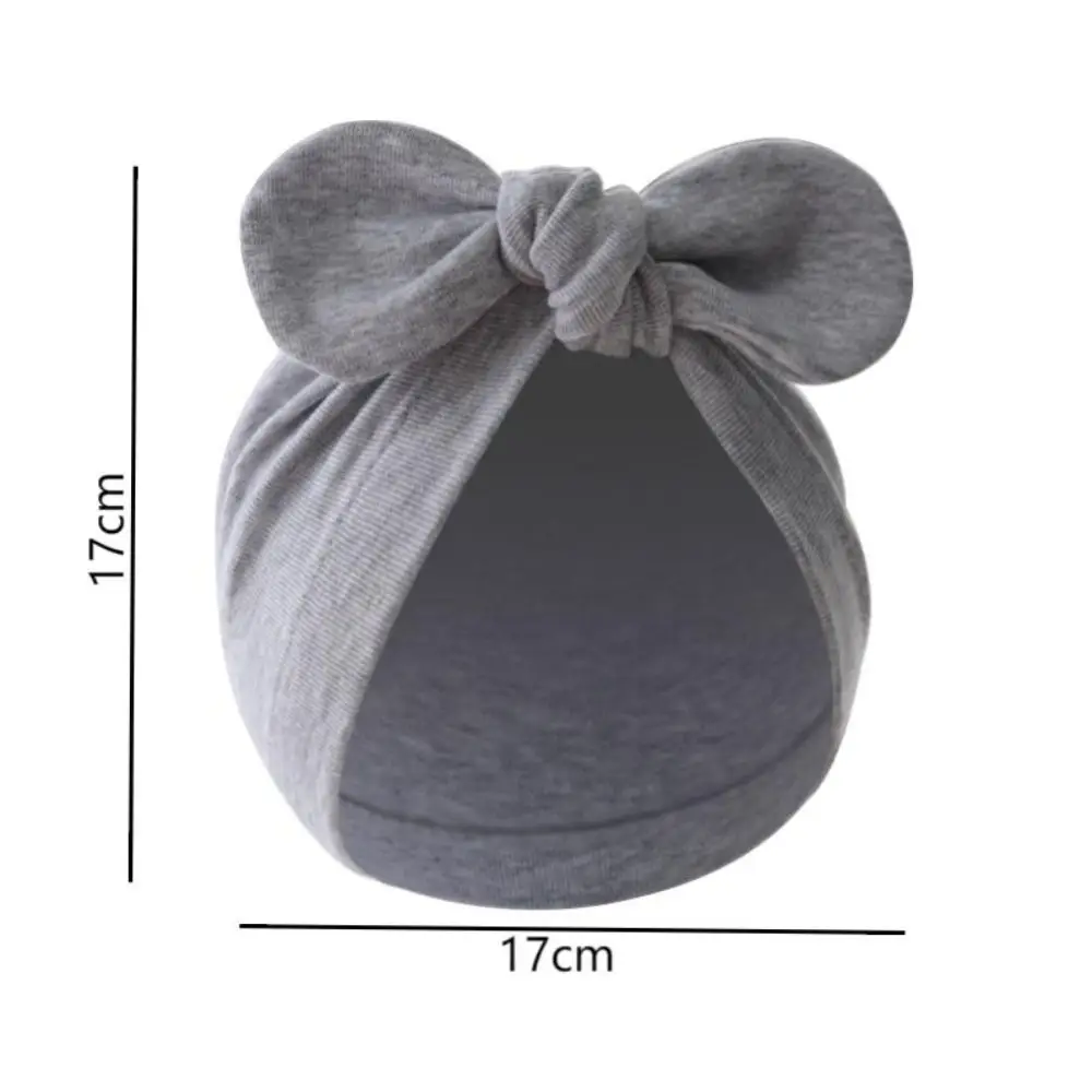 Diadema de bebé con nudo decorativo y orejas de conejo