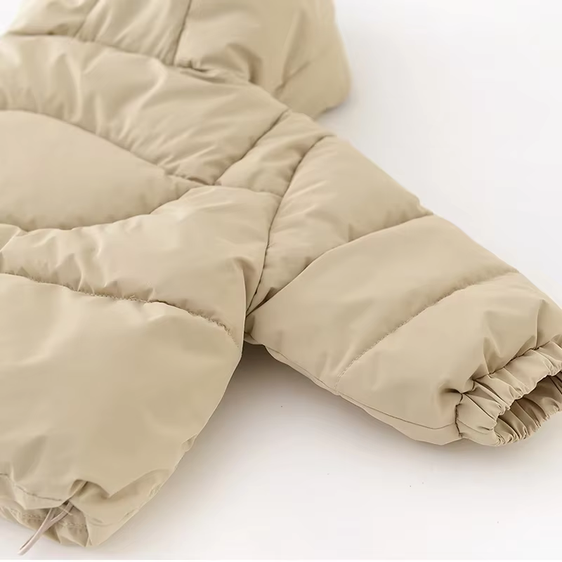 Abrigo acolchado infantil con capucha – Estampado dinosaurio - imagen 3
