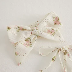 Mono floral de verano para niña sin mangas con volantes y diadema