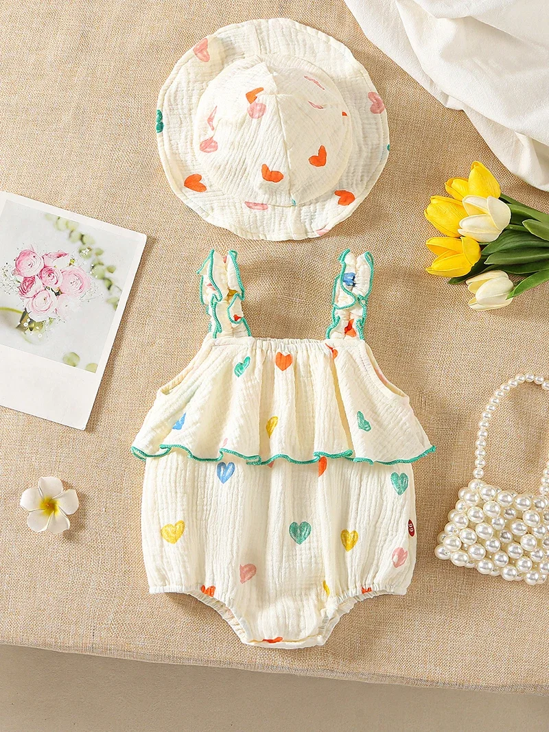 Mono tirantes niña de verano con estampado corazón y sombrero - imagen 4