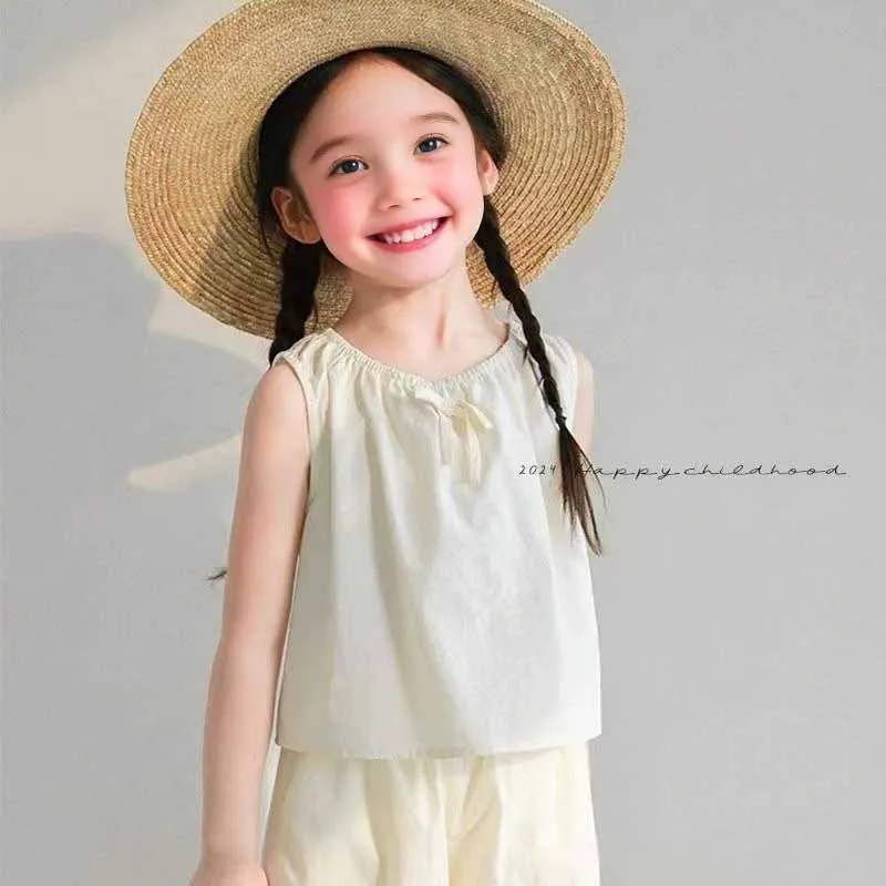 Conjunto verano infantil con chaleco y pants holgado