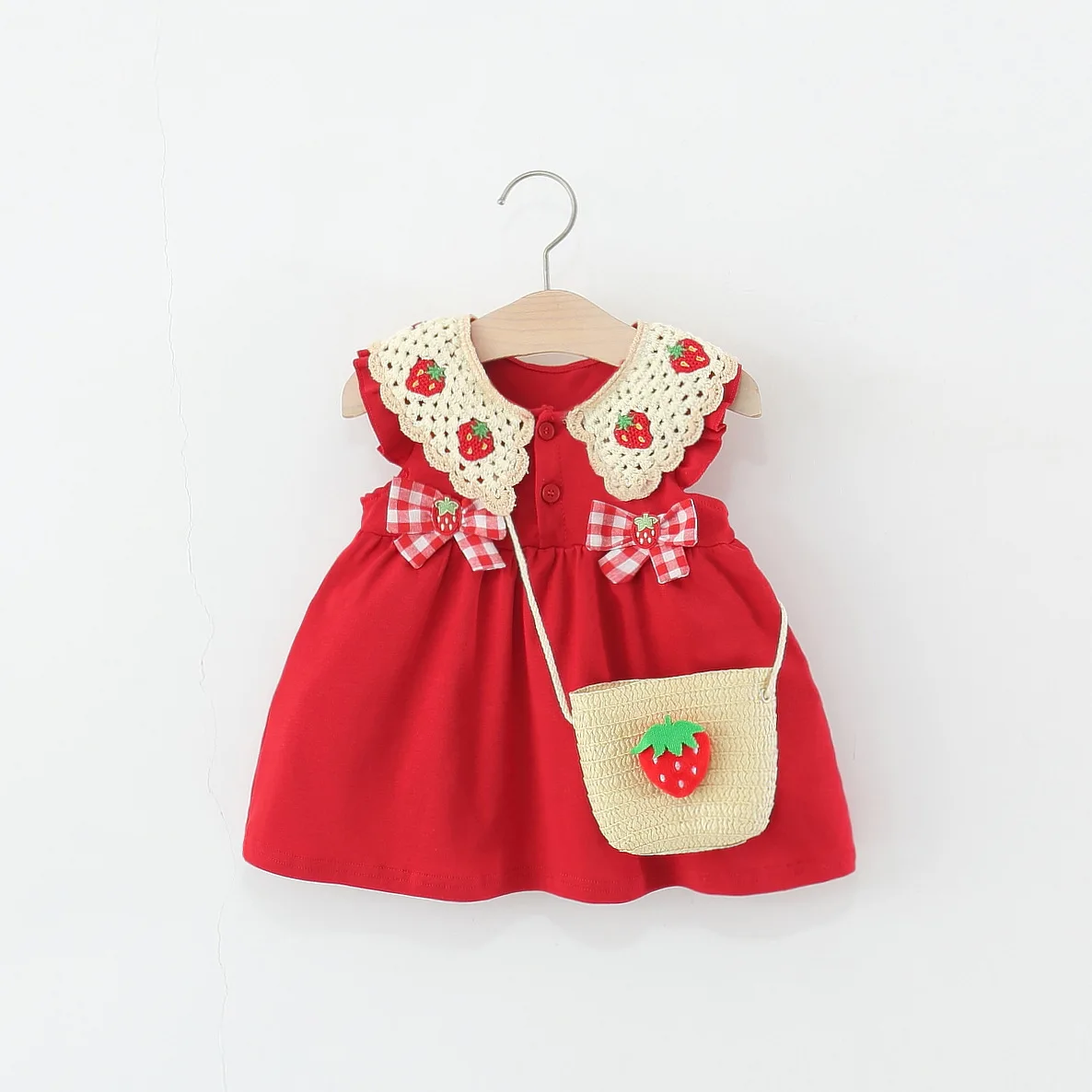 Vestido rojo sin mangas con lazo de fresa y bolso para niña