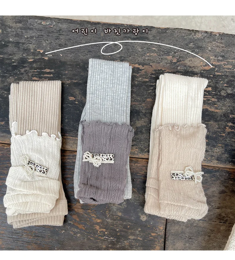 Leggings de algodón peinado para niña con lazo y encaje rayado - imagen 5