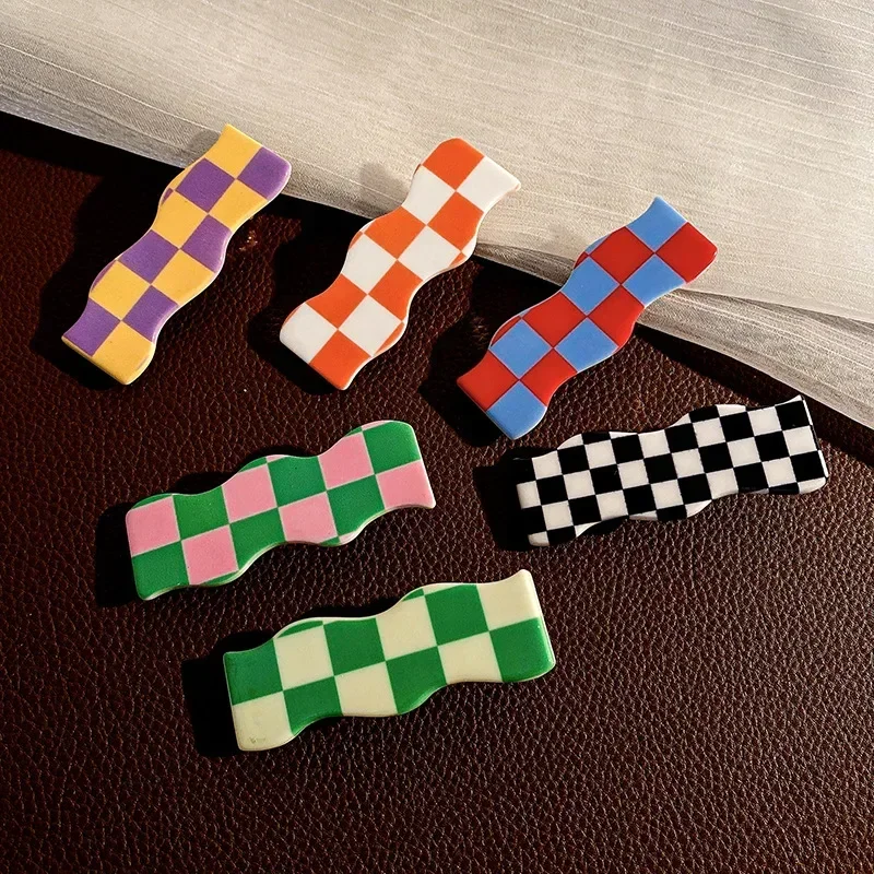 Clips para el pelo con patrón ajedrezado negro y blanco, sin marcas