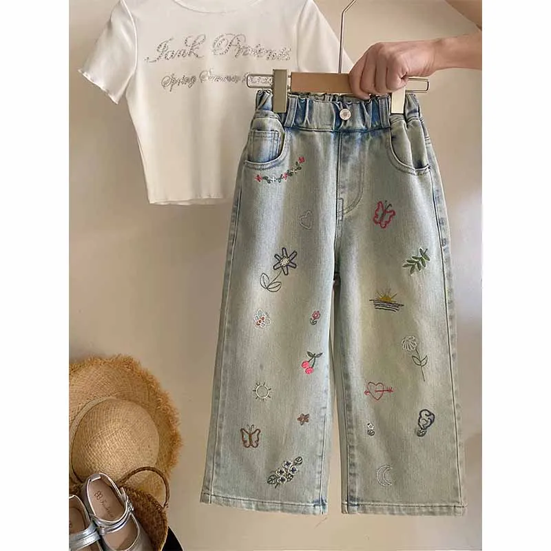 Pantalones rectos sueltos de primavera - detalle de tejido