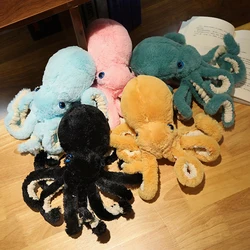 Peluche de pulpo multicolor con ventosa y ojos azules