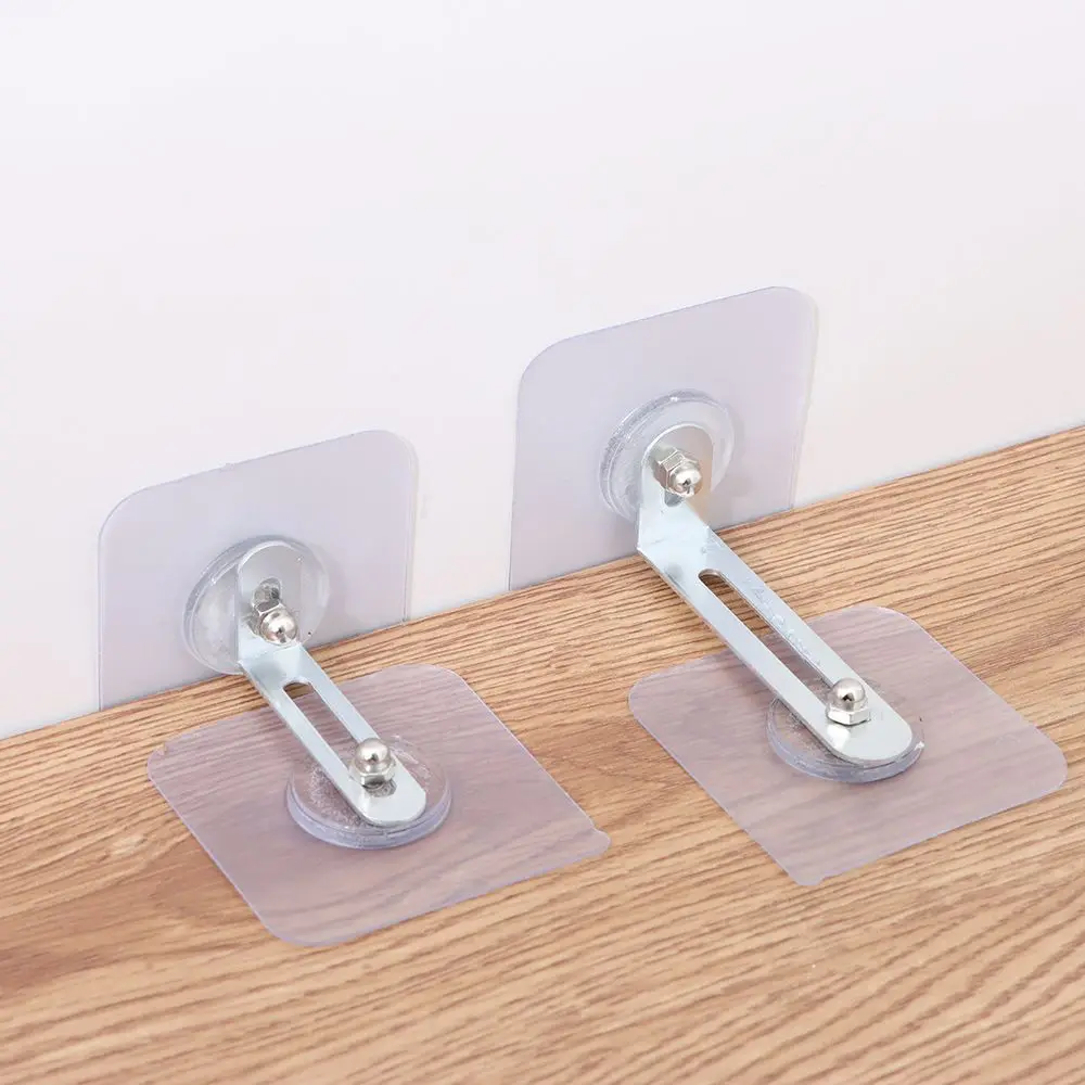 Clip antivuelco infantil autoadhesivo para muebles con anclaje - imagen 2