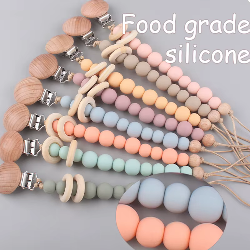 Sujetachupetes de silicona y madera natural para bebé - imagen 3
