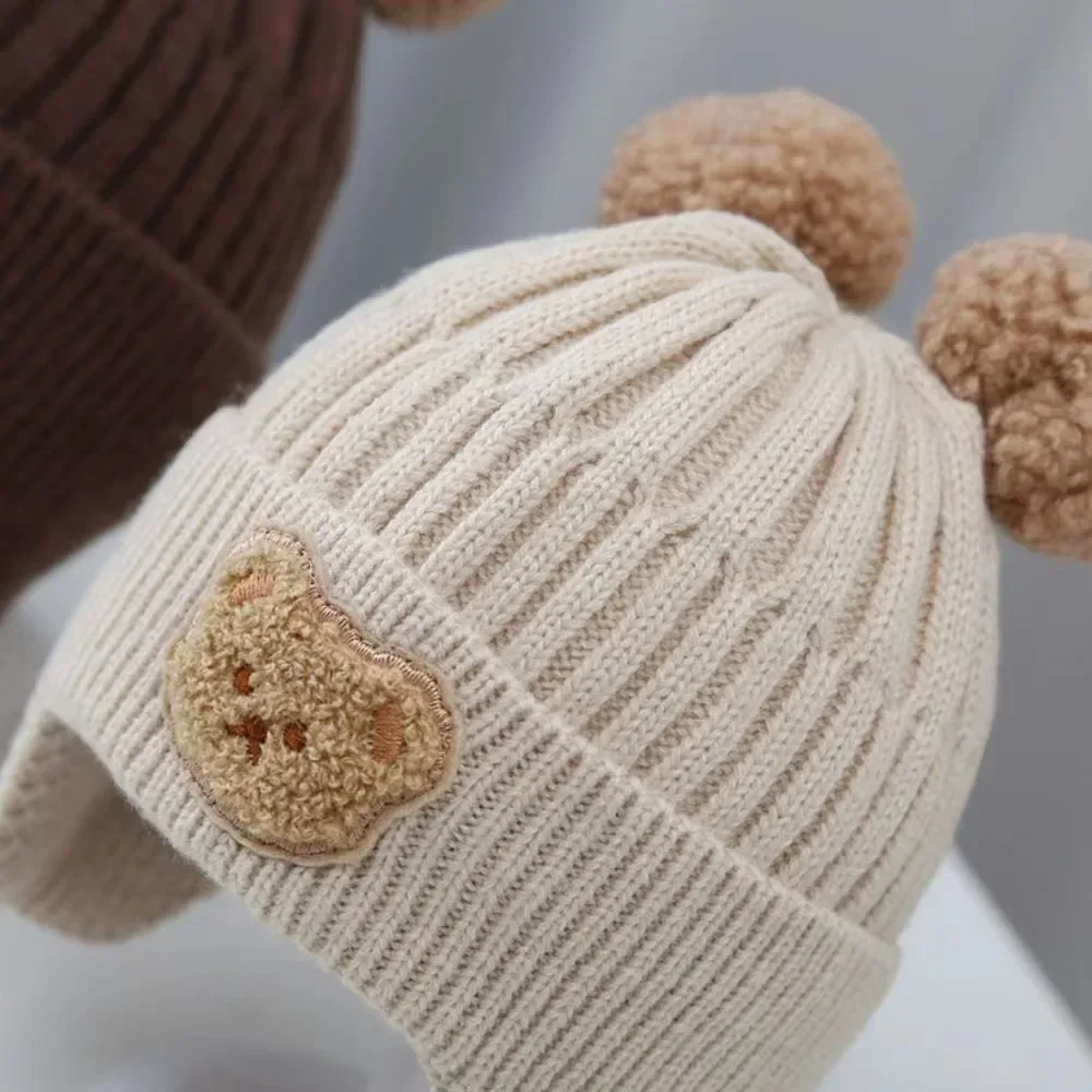 Gorro de lana con protección auditiva para bebé - imagen 4