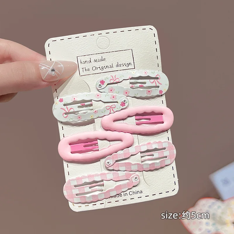 Clips para el pelo de niña con estampado floral y flequillo - imagen 5