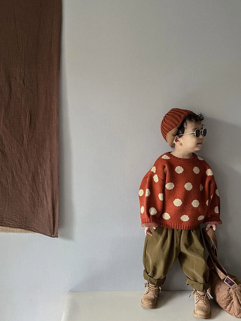 Jersey infantil en tono verde suave