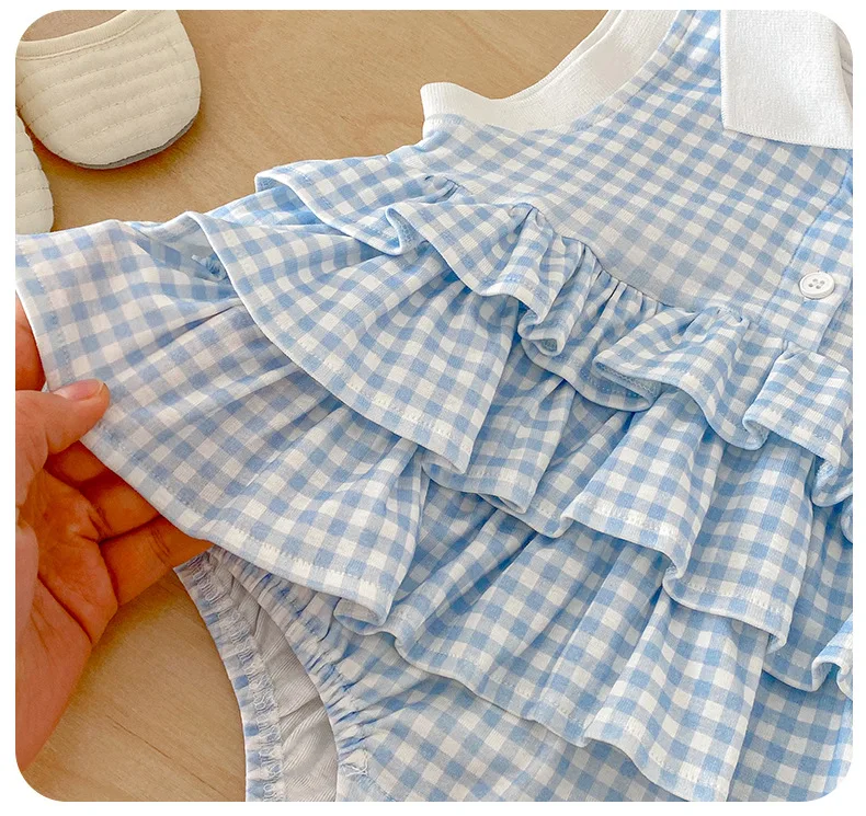 Pelele de verano sin mangas para niña con falda a cuadros y abertura - imagen 2