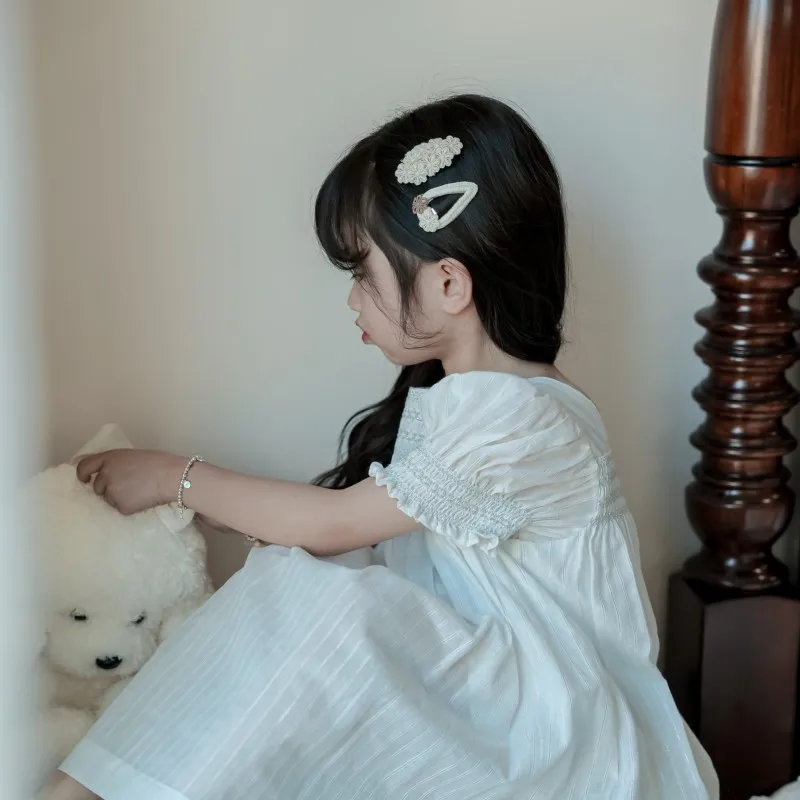 Pasadores de pelo con lazo floral de encaje beige para bebé niña - imagen 3