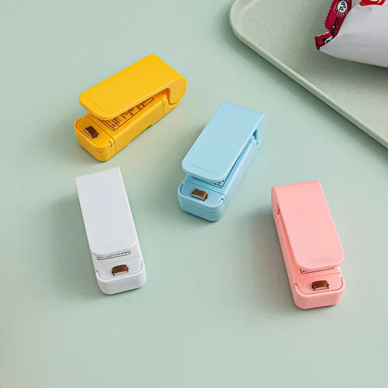 Mini sellador térmico portátil de bolsas para alimentos al calor - imagen 3