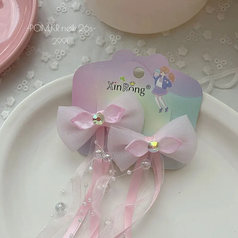 Pinzas de pelo con lazo estrella para niña - Color rosa