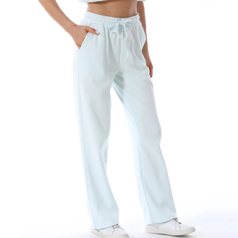 Pantalones maternidad punto waffle, cintura alta y bolsillos suaves