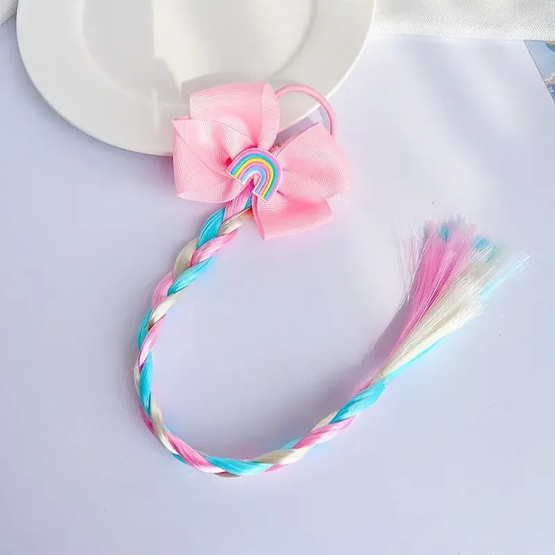 Peluca unicornio color caramelo para niños con lazo de mariposa