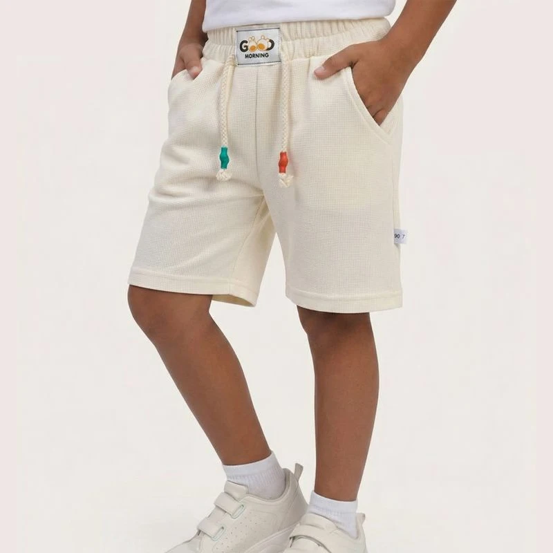 Pantalones cortos de niño color caramelo con cintura elástica - imagen 5