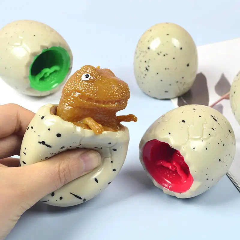 Juguete antiestrés dino en taza de goma suave - imagen 4
