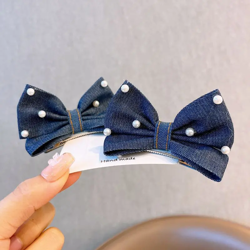 Pinzas para el pelo con lazo vaquero y perlas de niña - imagen 4