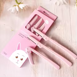Recortador de cejas plegable rosa con cuchillas acero inoxidable