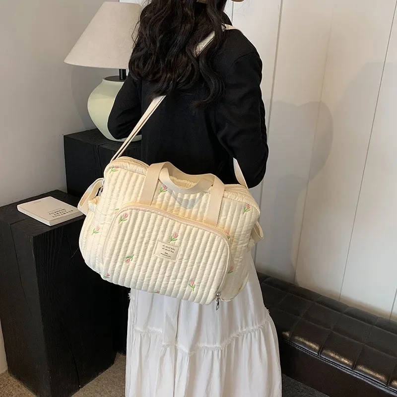 Bolso pañales de algodón beige con cremallera y estampado de oso