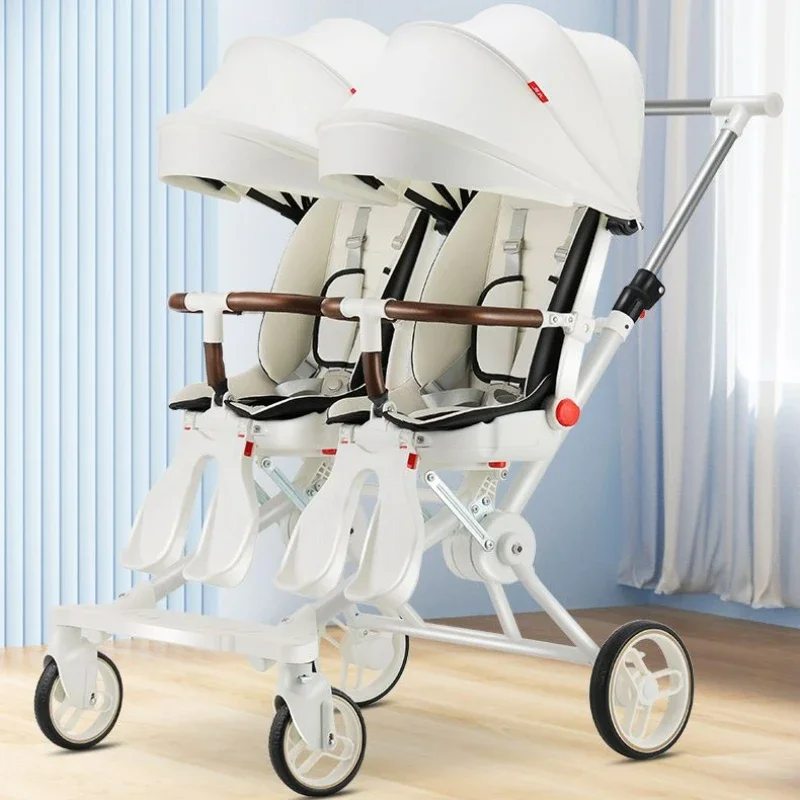 Cochecito gemelar pliable de cuatro ruedas – Cómodo y funcional