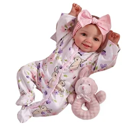 Muñeca reborn NPK con cara sonriente y cuerpo de tela suave
