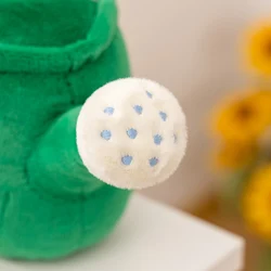 Juguete de peluche regadera verde con flores realistas