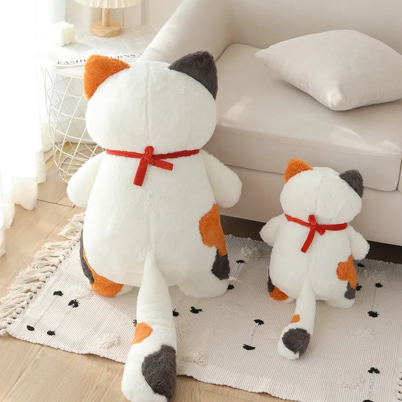 Peluche de gato con flor naranja y campanilla para decorar - imagen 3