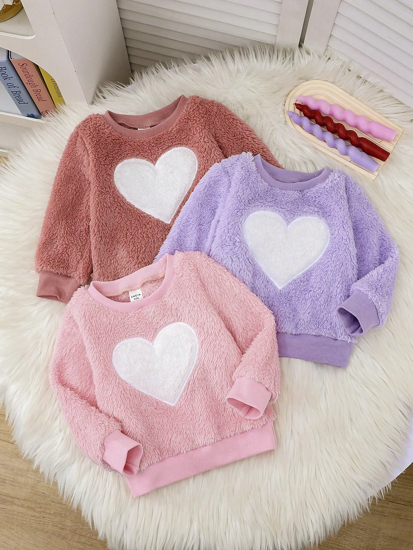 Sudadera peluda corazón frontal