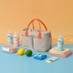Bolso cambiador con ganchos para cochecito y bandolera cruzada