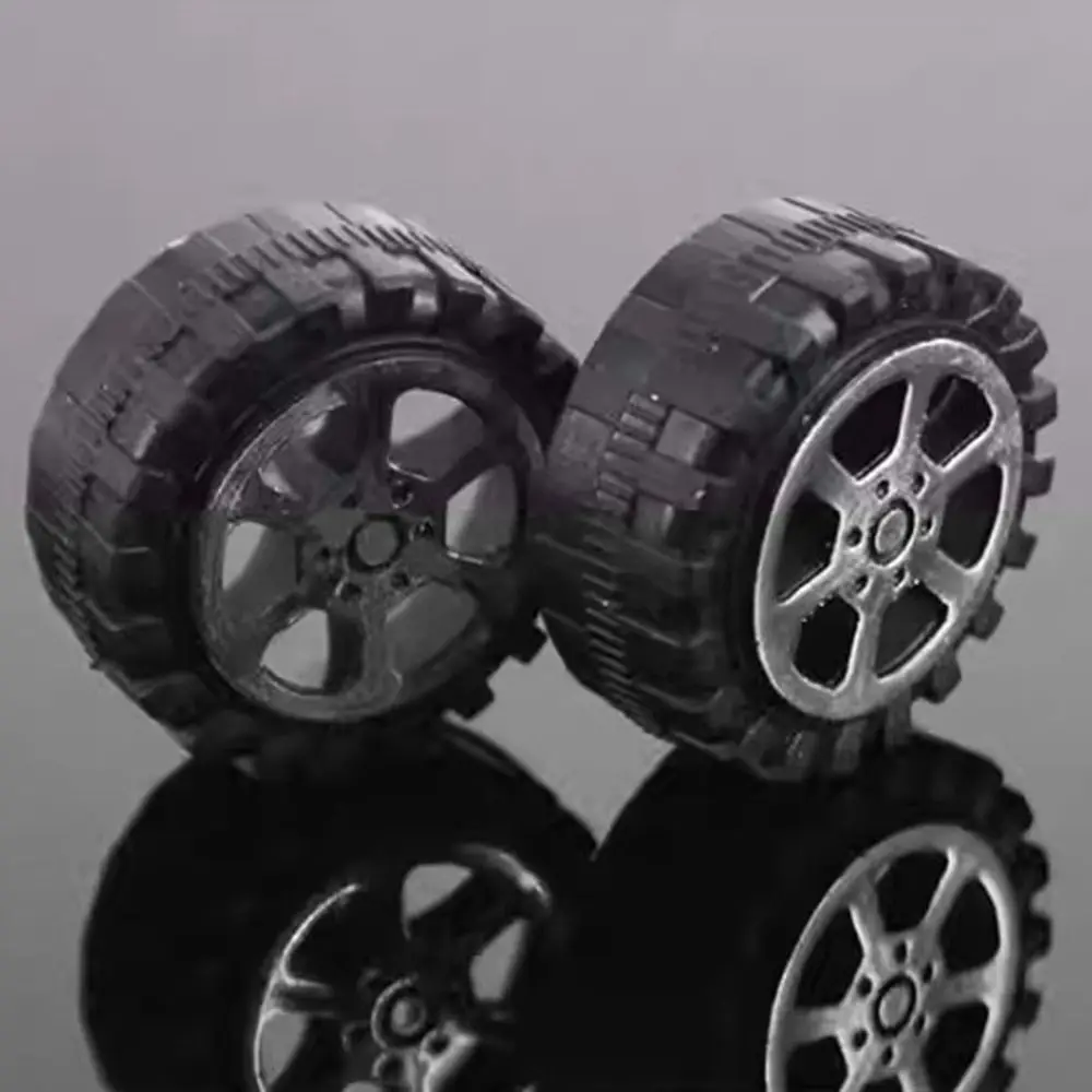 Ruedas de plástico negro universales para juguetes - imagen 2