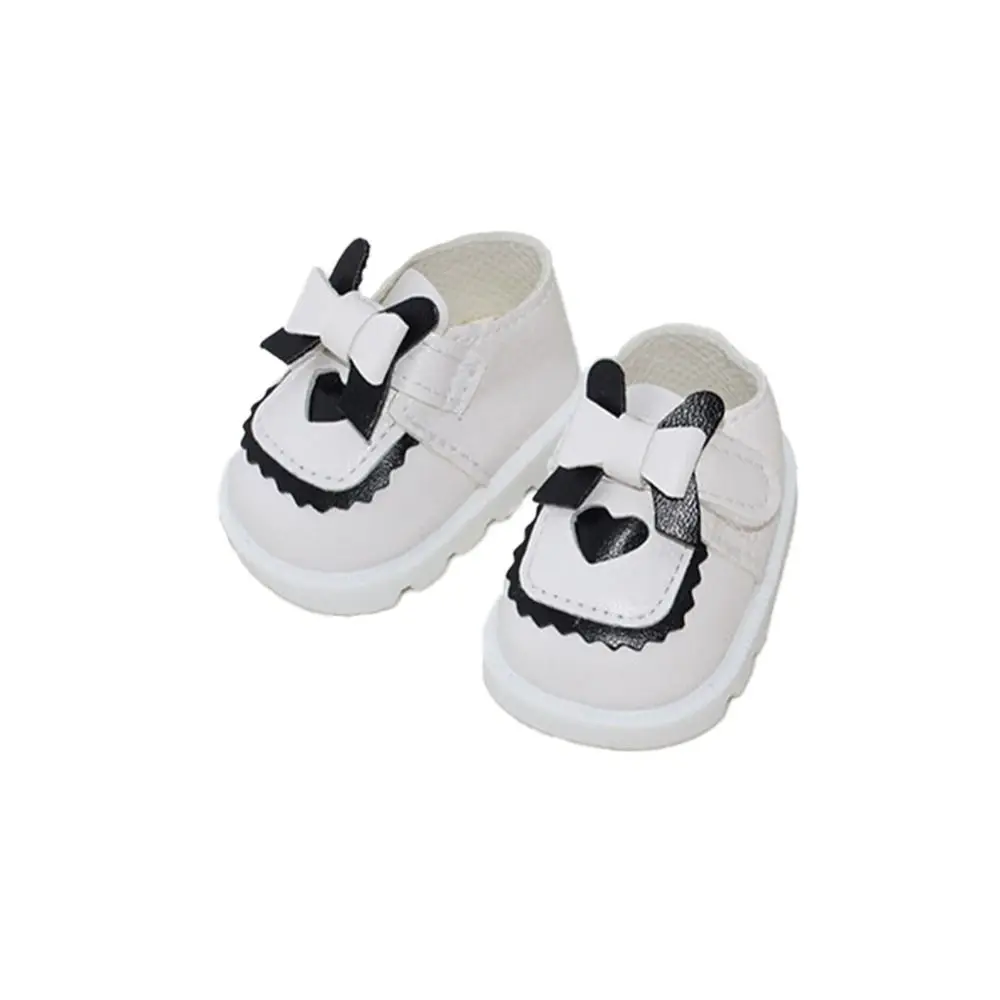 Par de botas de muñeca para juego
