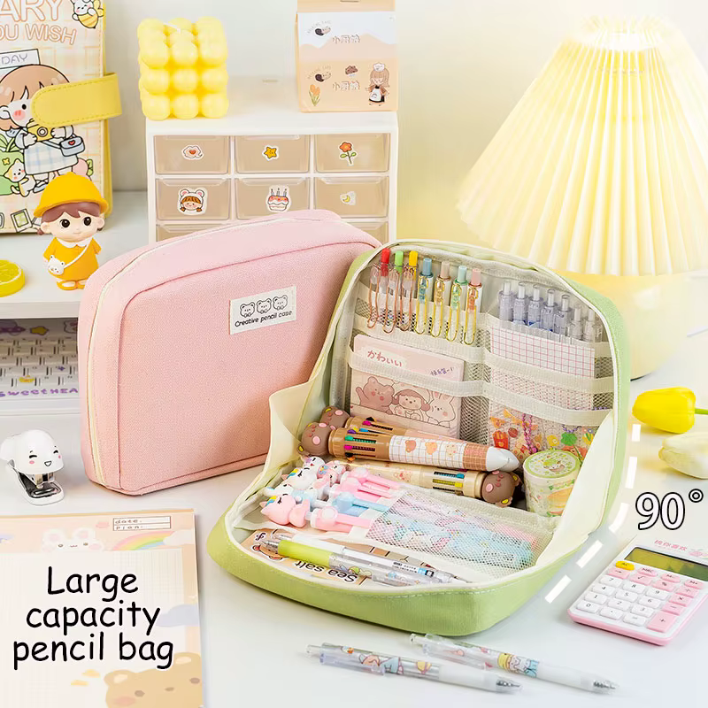 Estuche Kawaii rosa abierto compartimentos