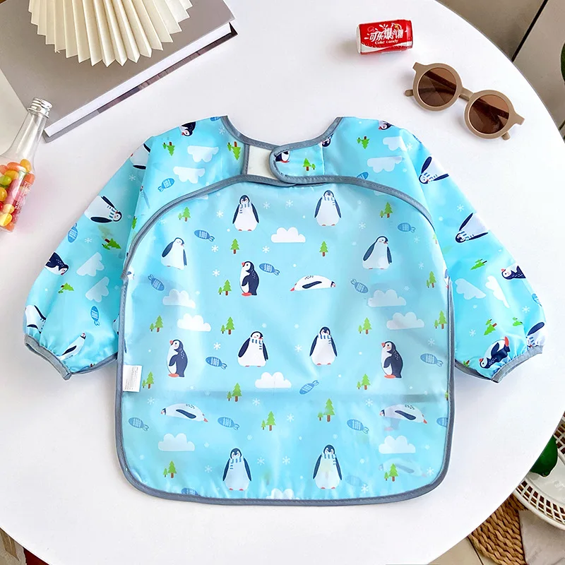 Babero infantil impermeable para comidas y juegos