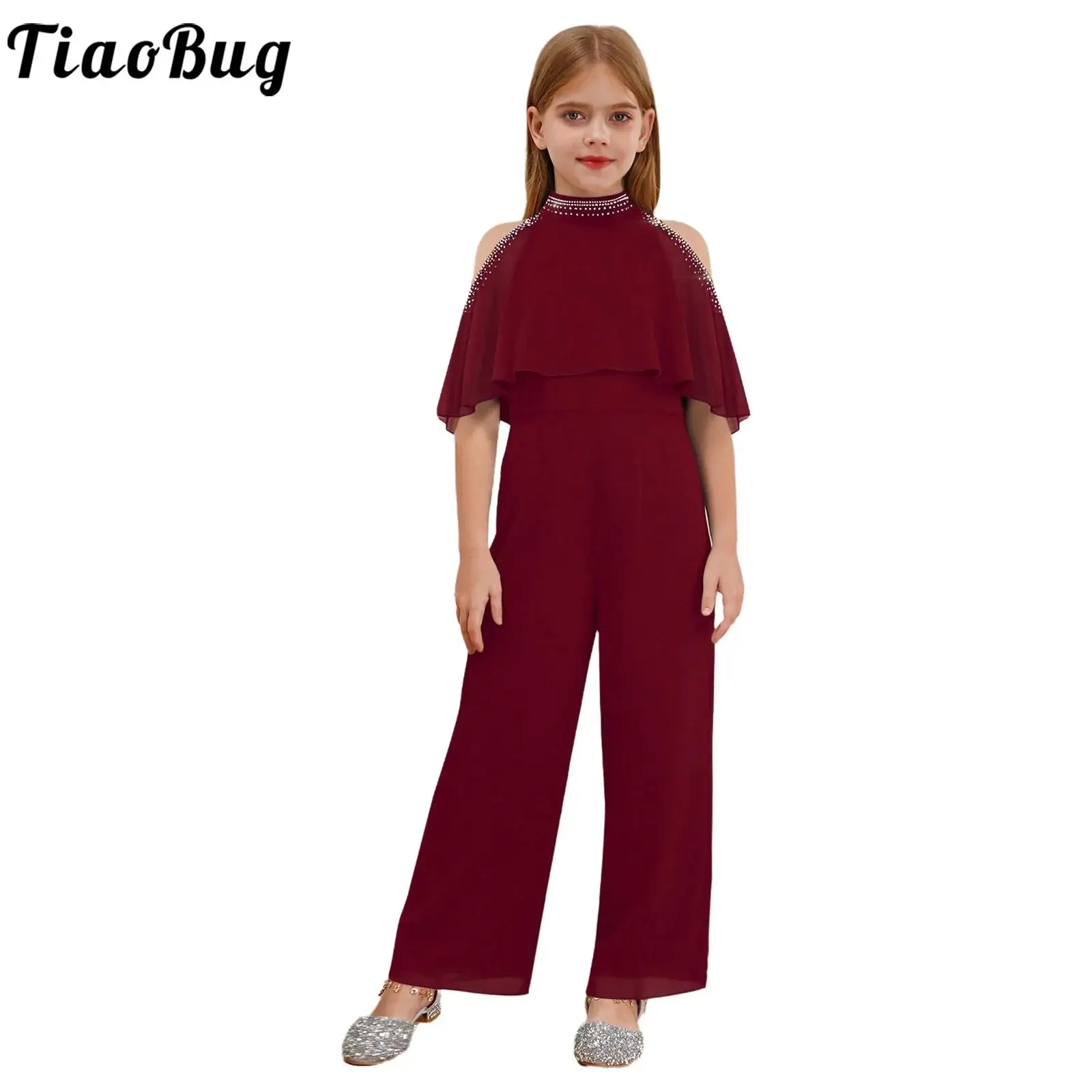 Mono de niña elegante con pedrería brillante y pierna ancha