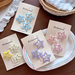 Pinzas para el cabello de estrella hueca macaron con cierre a presión