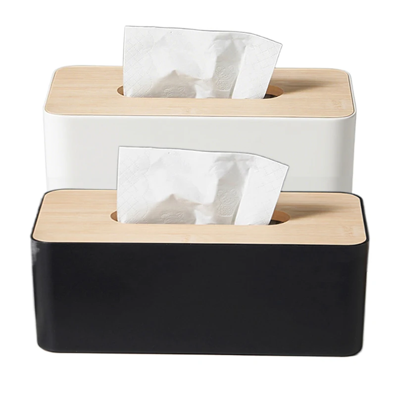 Soporte de caja de pañuelos negro en escritorio o encimera
