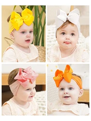 Diadema bebé niña con lazo grande de nailon para invierno
